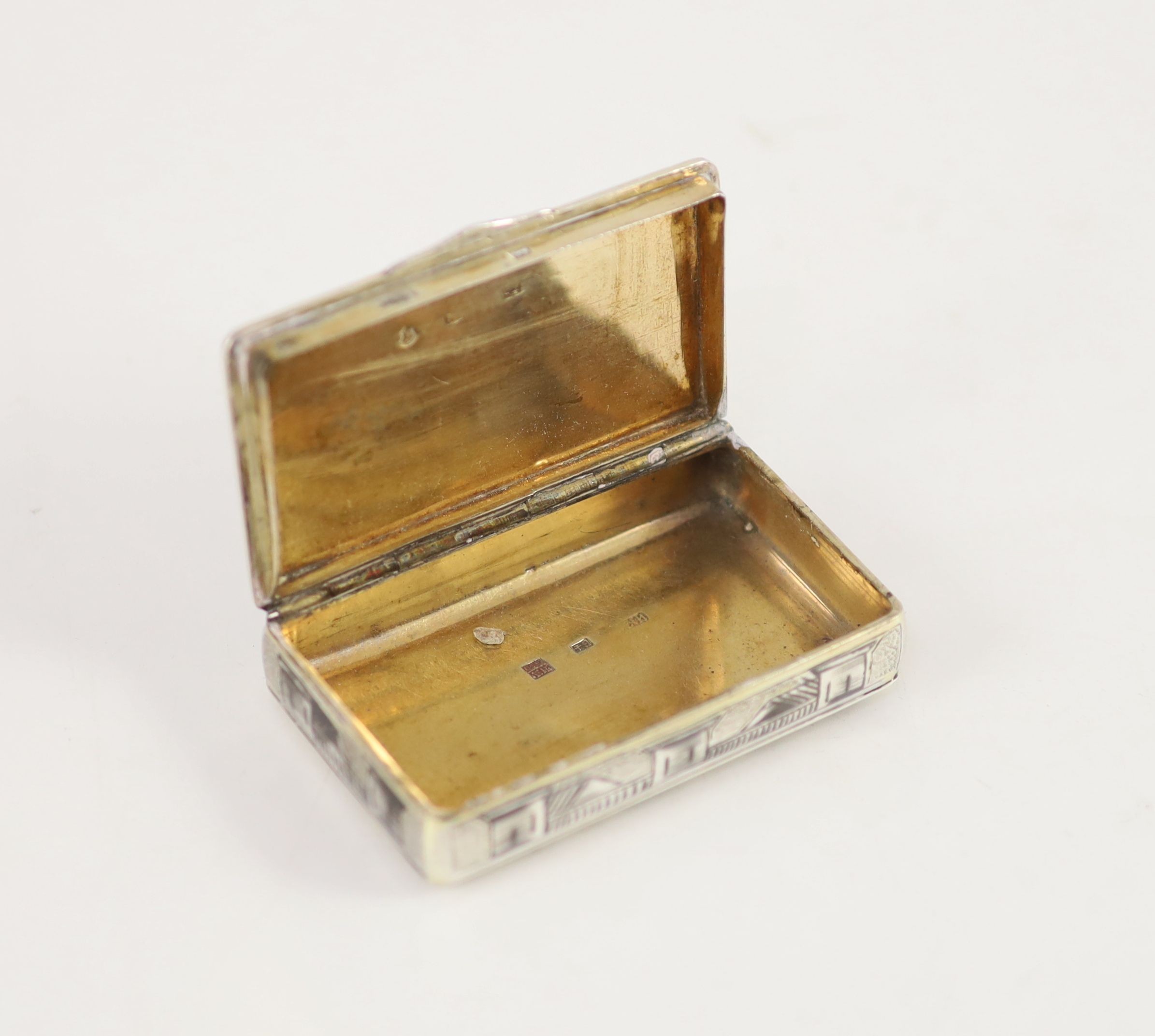 An early 19th century Russian 84 zolotnik parcel gilt silver and niello snuff box, assay master possibly Nicholai Brubovin,1830